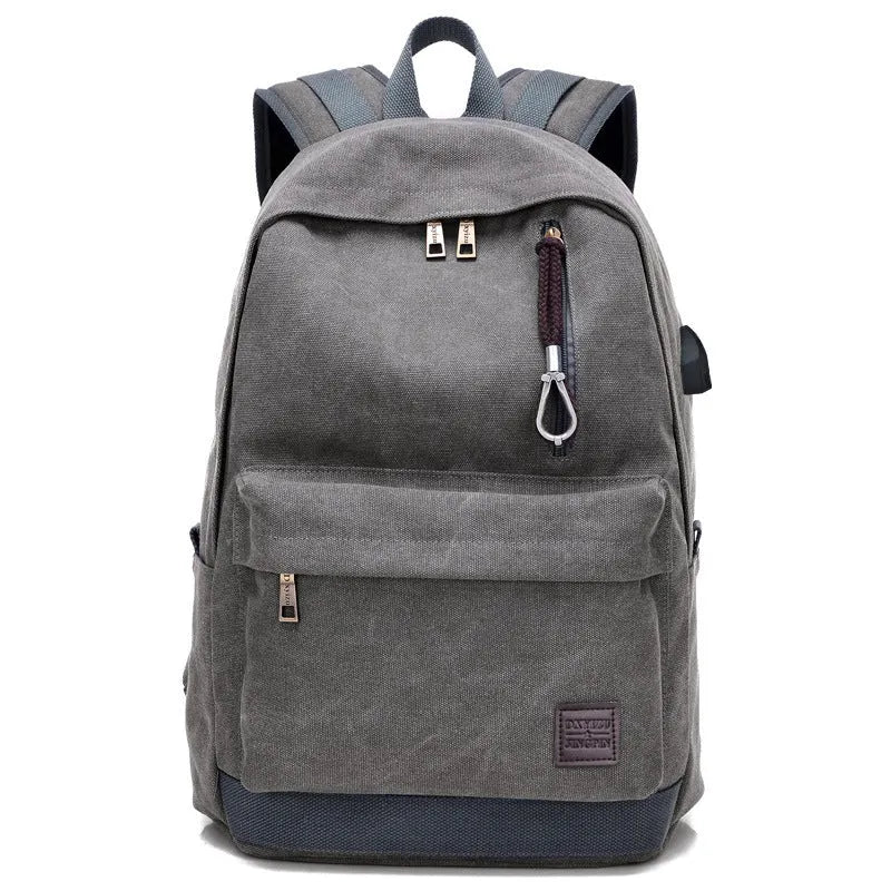 Canvas backpack with USB charging port in grey colour showing multiple compartments