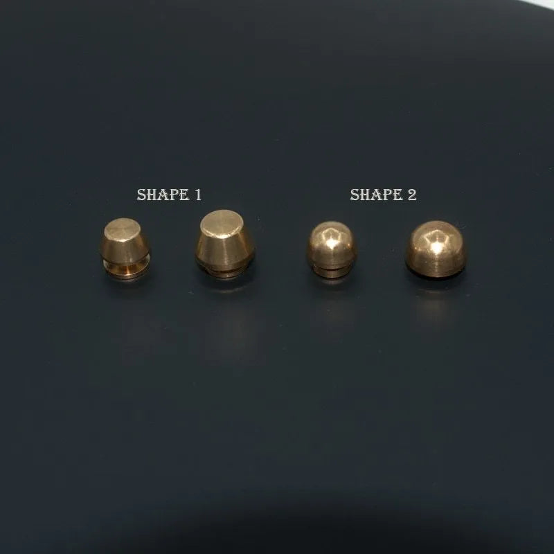 Brass decorative buckles in round and geometric shapes, sizes 10x6mm and 12x7mm.