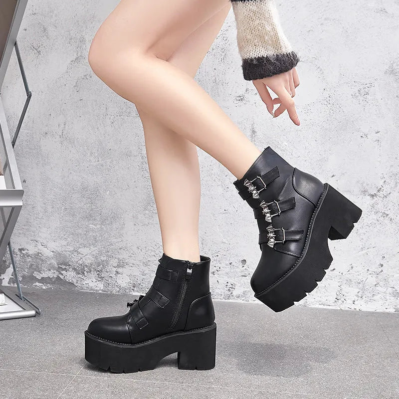 Black women's Harajuku punk ankle boots with bat buckle, thick heel, and side zip.
