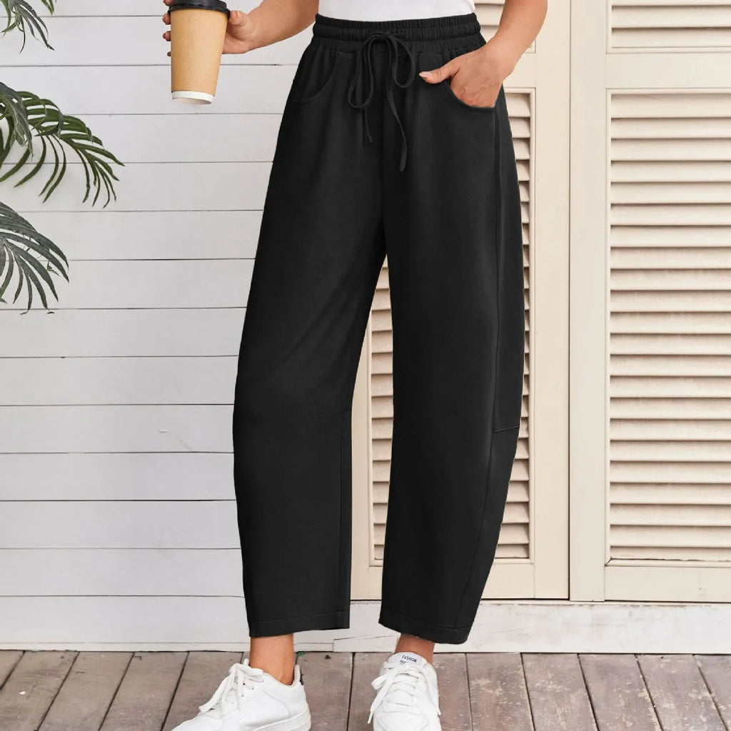 Loose cropped sweatpants with drawstring waist in cotton blend fabric for streetwear fashion