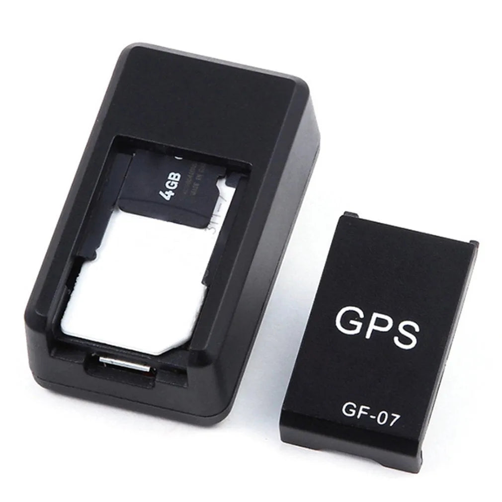 Black magnetic GPS car tracker device with compact rectangular design and USB charging port