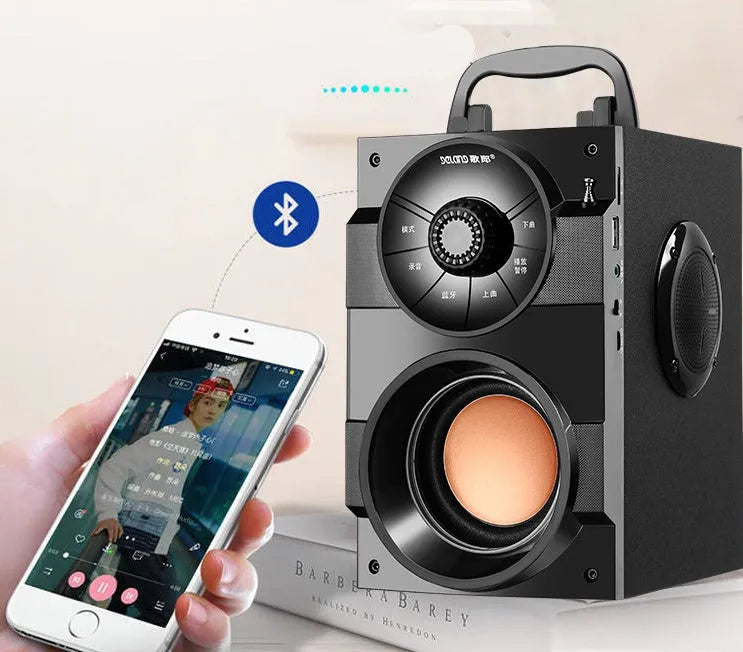 Black portable mini home audio system with subwoofer, satellite speakers, and USB charging cable