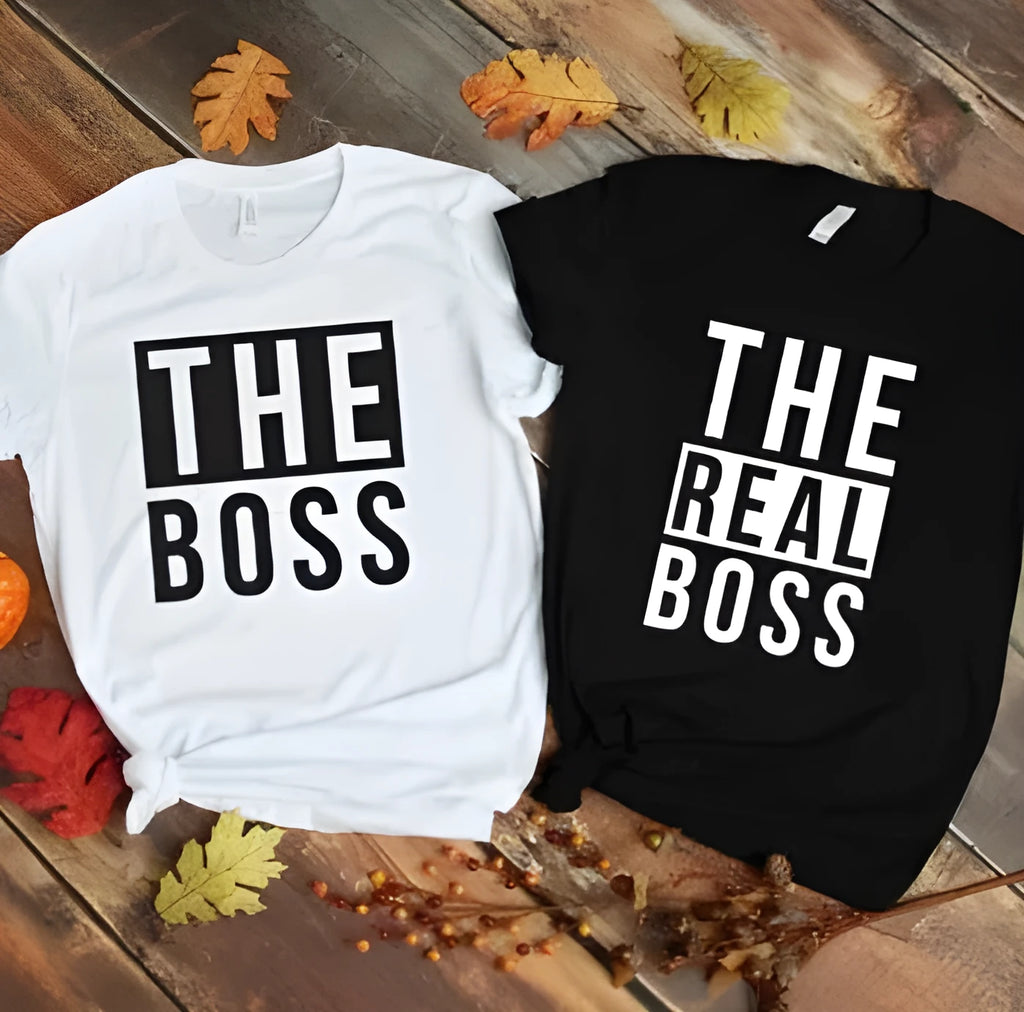 A man's loose fit round neck T-shirt with a printed graphic on the front, shown in a casual style.