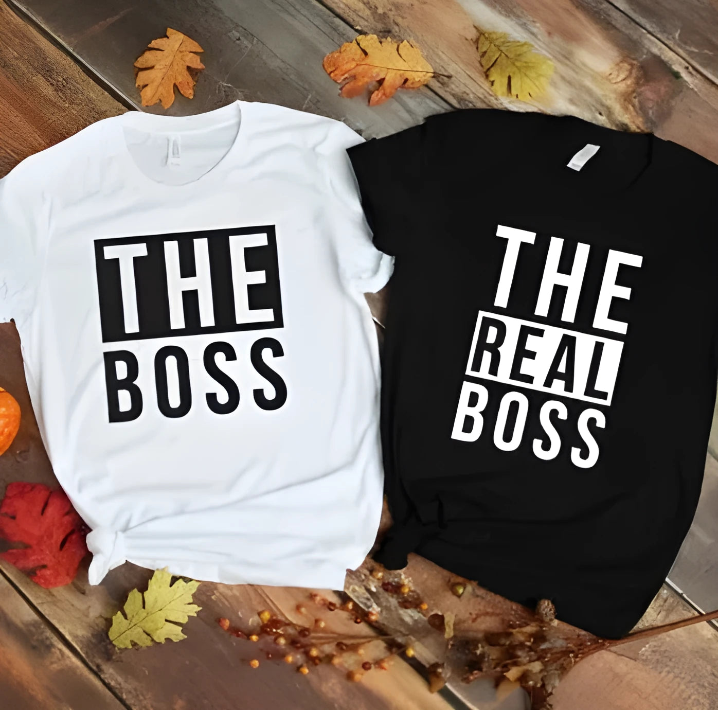A man's loose fit round neck T-shirt with a printed graphic on the front, shown in a casual style.