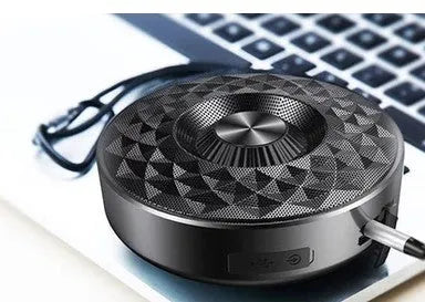 Mini Bluetooth wireless speaker in black, orange, and silvery white colours showing front view