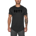 A plain men's grey gym shirt made from cotton and spandex fabric on a hanger.