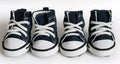 Navy blue denim canvas dog shoe with non-slip sole on a dog