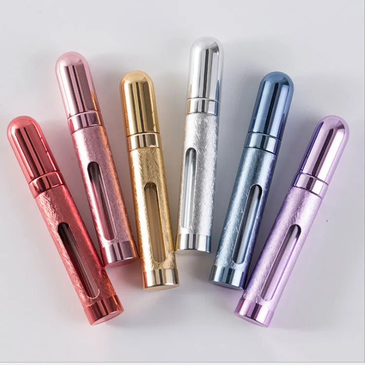Slim 12ml aluminium travel perfume bottle in six colour options: blue, gold, pink, red, silver, violet.