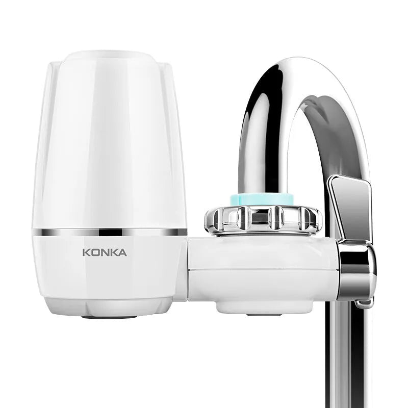 White kitchen tap water filter with ceramic cartridge showing switchable flow control and universal adapter fittings