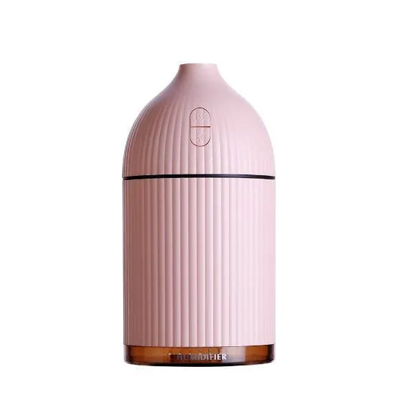 White cylindrical ultrasonic aromatherapy diffuser with LED light and 300ml water capacity.