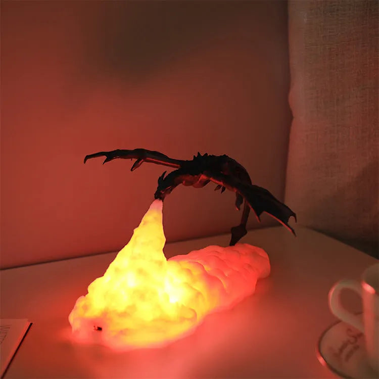 3D printed red dragon night light with glowing effect on a dark surface