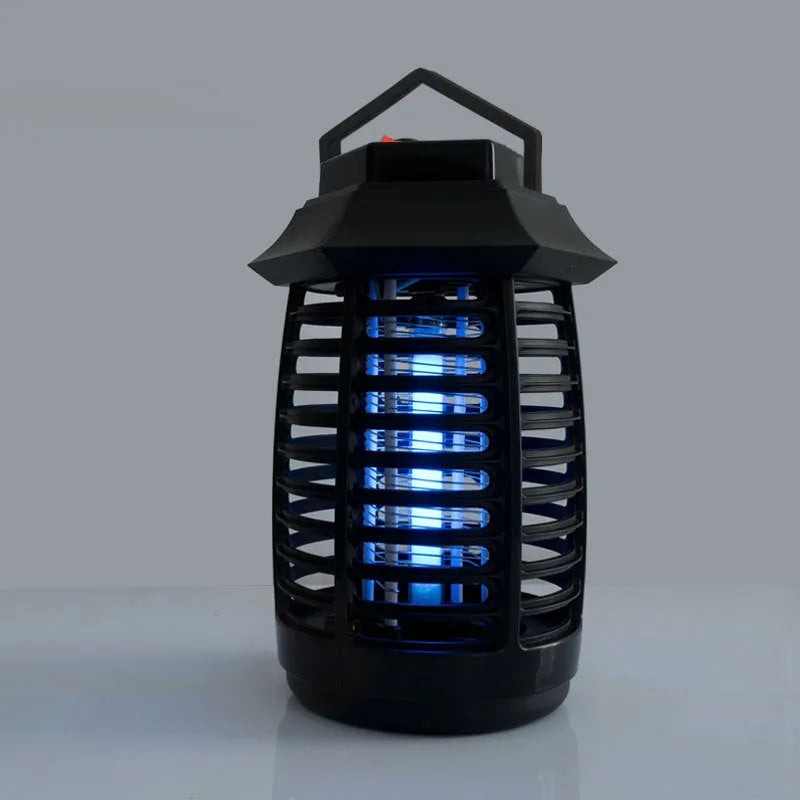 Black aromatherapy mosquito killer lamp with UV light and electric grid for insect control.