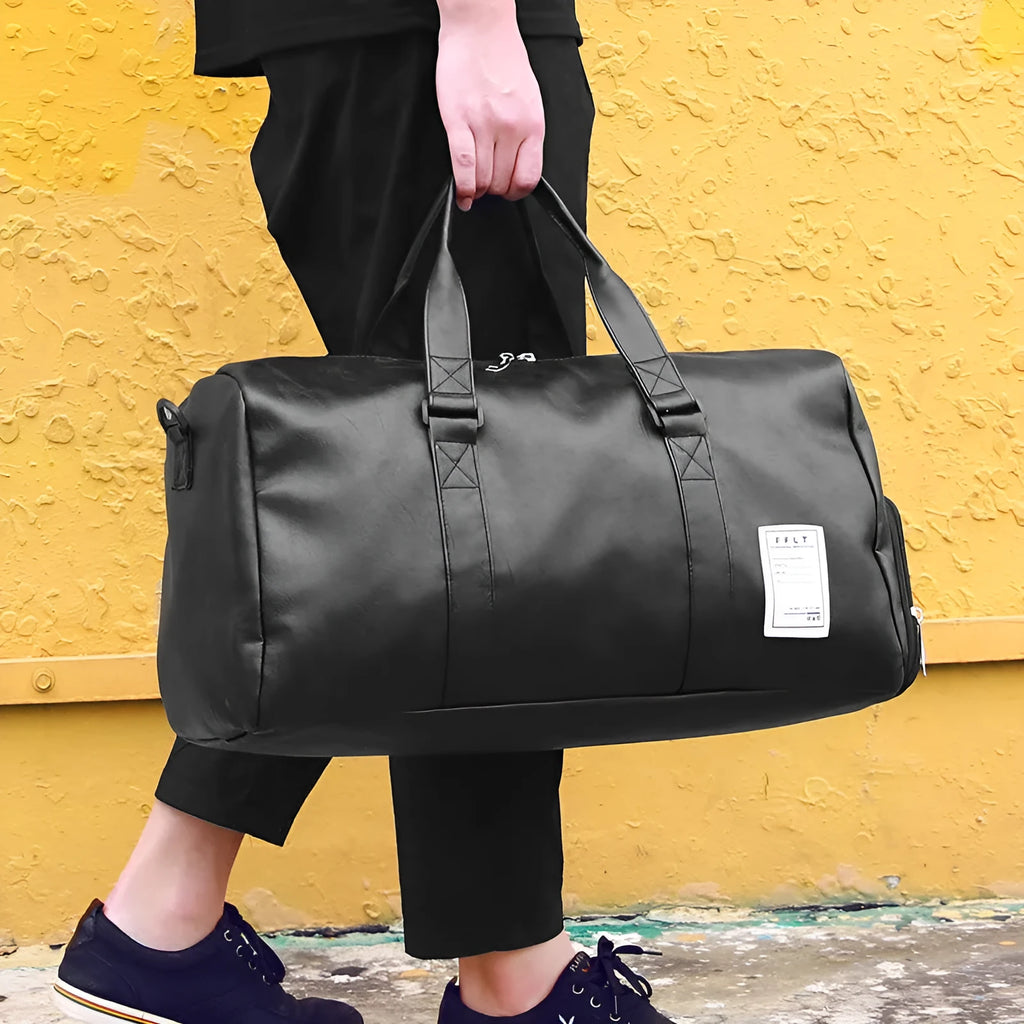 Black waterproof sports bag with diagonal straps and a separate shoe compartment, shown in large and small sizes.