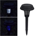 Black solar-powered insect killer garden lamp with white LED and UV purple light.