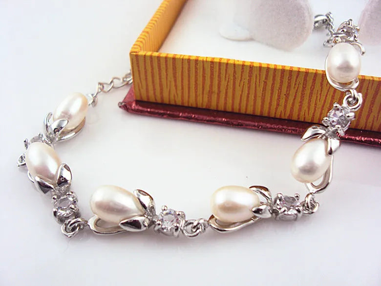 Freshwater pearl bracelet with Korean crown design on white background