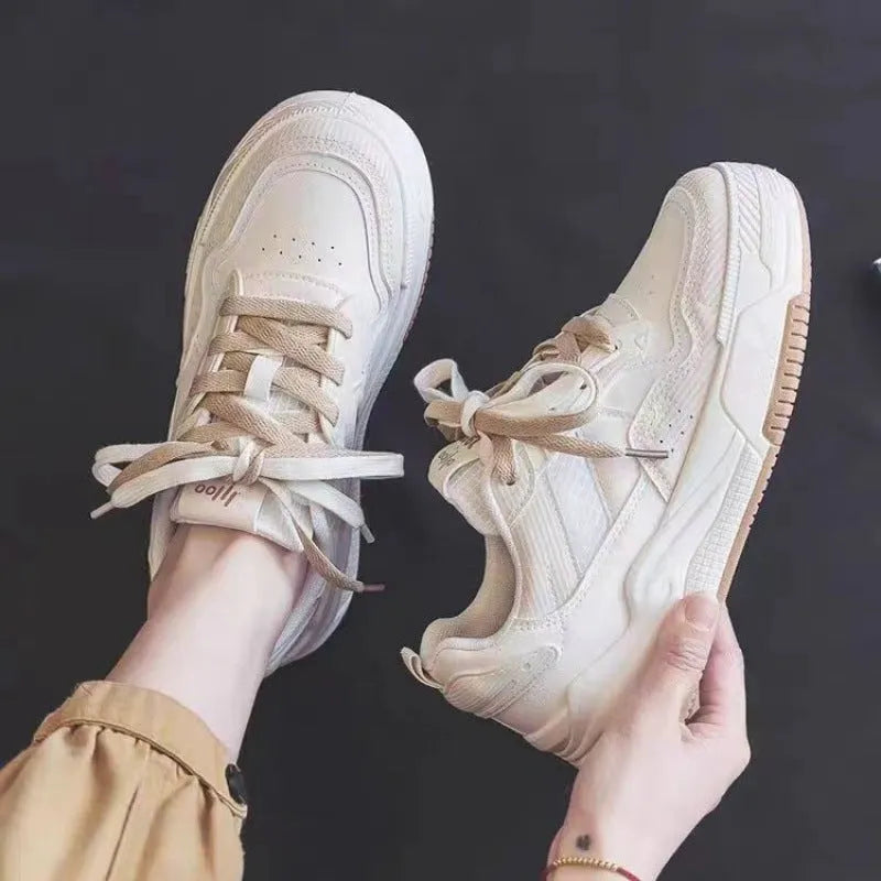 Beige and pink women's low-top rubber sneakers with a hidden height increase sole.