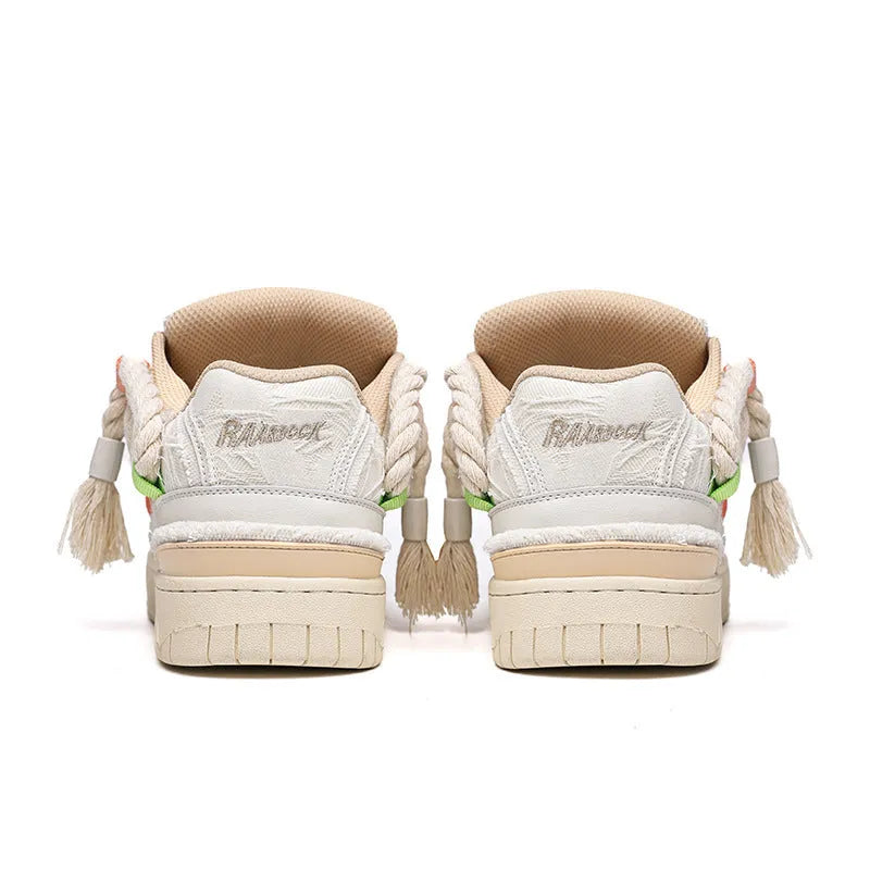 Creamy white retro skate shoes with low platform sole and lace-up design