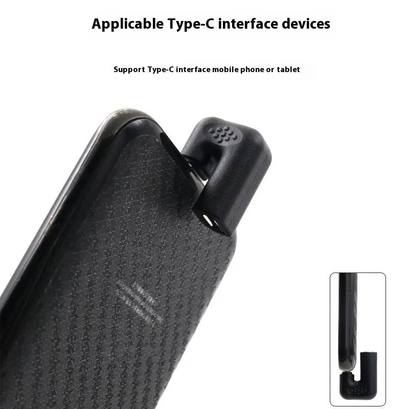 Four white USB-C Male to Female adapter cables with a U-bend shape on a grey background.