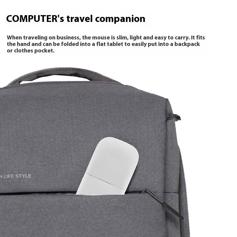 Black folding Bluetooth wireless mouse showing compact 14.5mm thickness when folded for portable laptop use