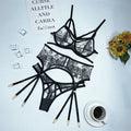 Black lace mesh women's three-piece set with floral print, showing top, trousers, and waist ring.