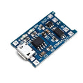 Blue lithium battery charging and protection board measuring 2.6 by 1.7 centimetres