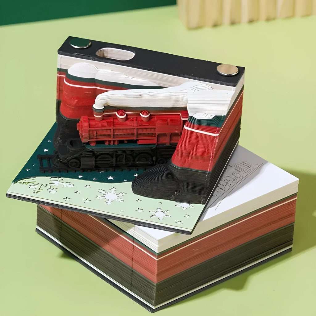 3D paper carving sticky notes with a raised Christmas Train design on the cover.