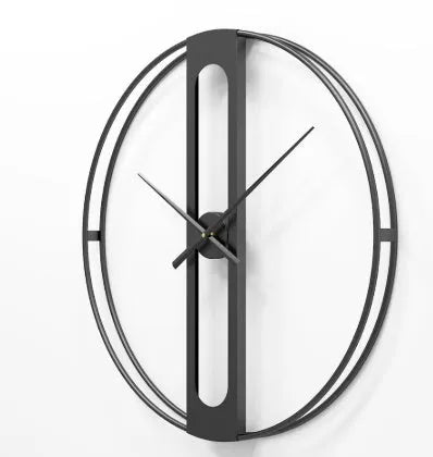 Large 50cm round metal wall clock in black or gold colour on a wall.