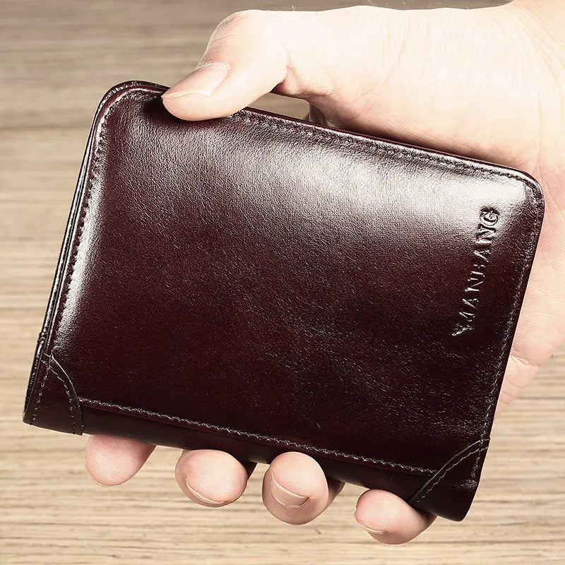 Men's leather wallet open to show internal card slots, cash section, coin pocket, and document holder.