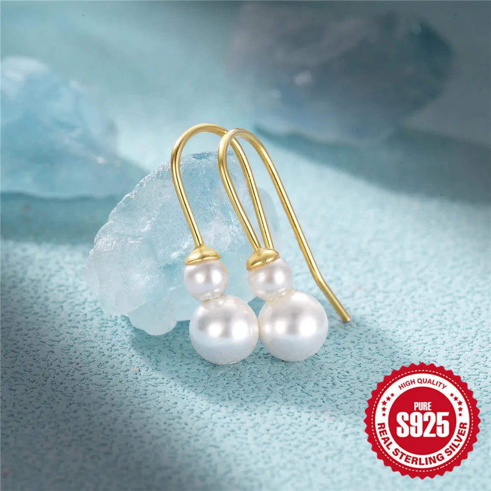 S925 sterling silver earrings with geometric sunflower design and golden zircon stones