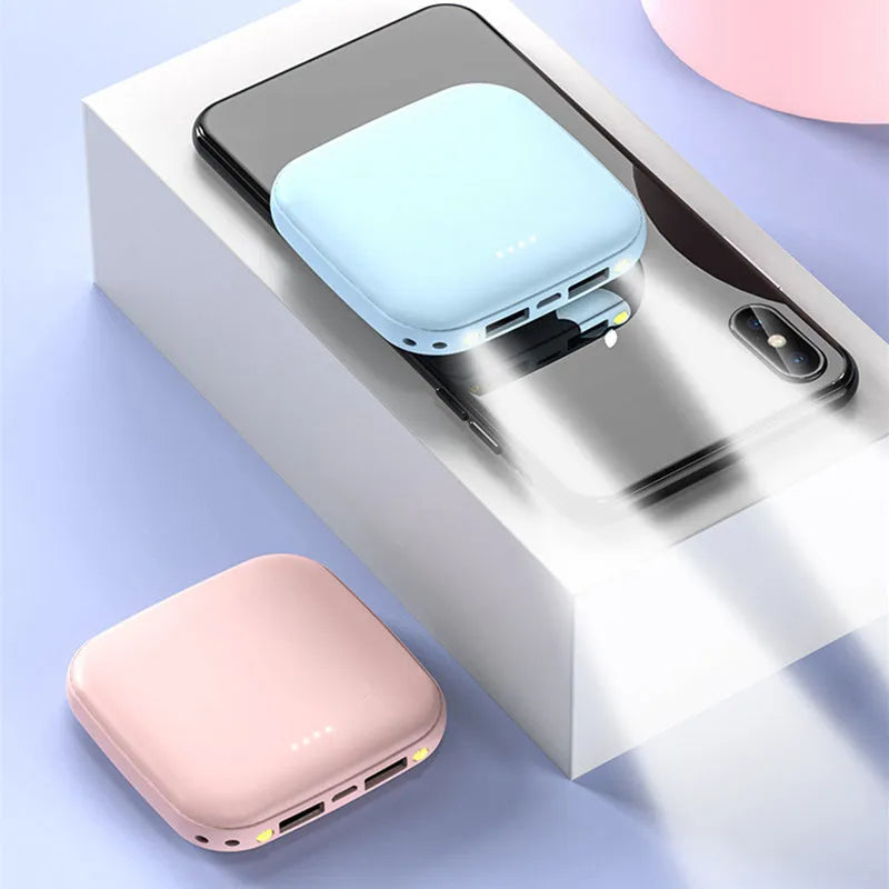 Portable 10000mAh power bank in black with multi-U port output and compact rectangular ABS shell design