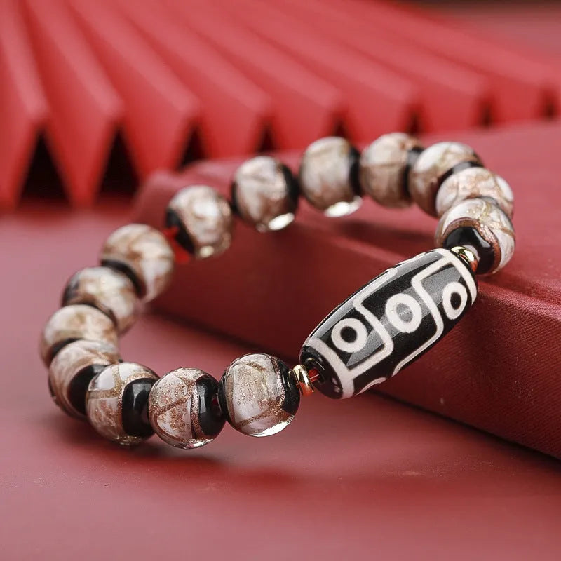 Chinese-style coloured glaze bracelet with five-colour snake lucky beads and auspicious patterns.