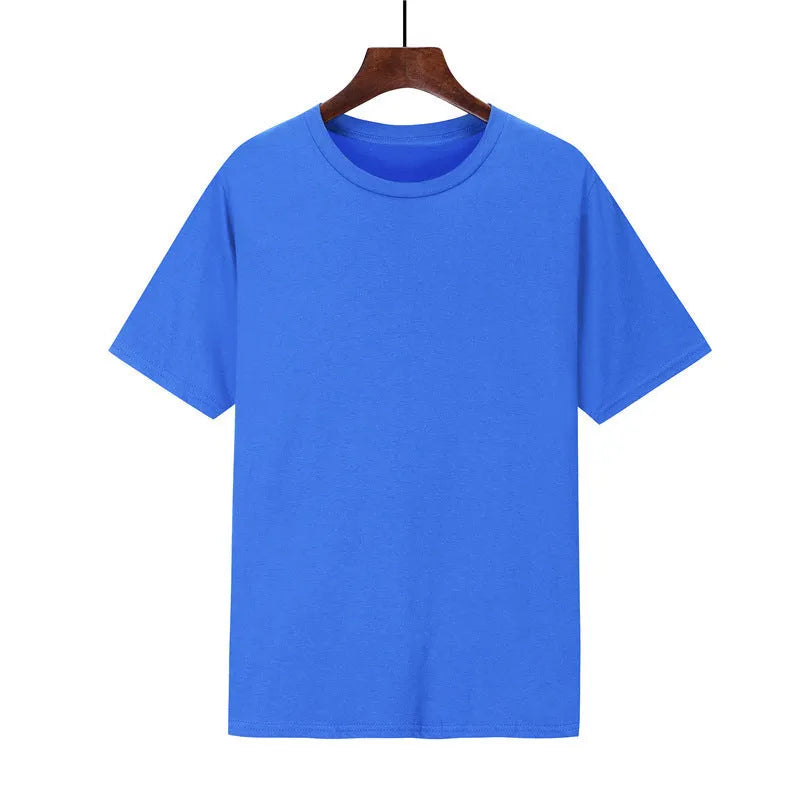 Men's black loose-fit cotton T-shirt with short sleeves on a plain background.