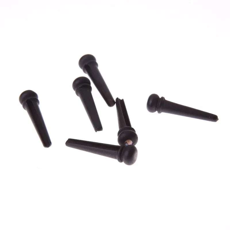 Six solid ebony guitar string pins with matt black finish for folk acoustic guitars