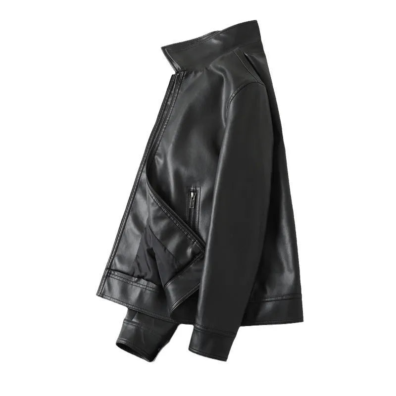 Men's solid black PU leather casual jacket with zipper pockets on a model.