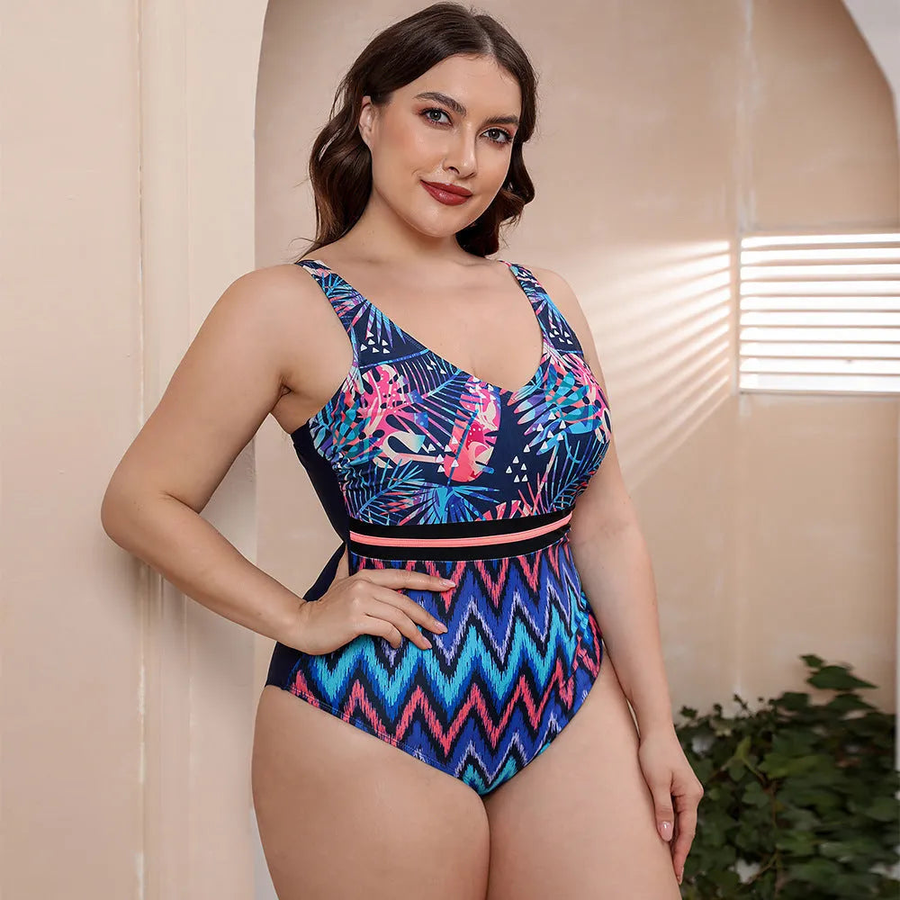 Women's blue striped vest print one-piece swimsuit with spaghetti straps on a mannequin.