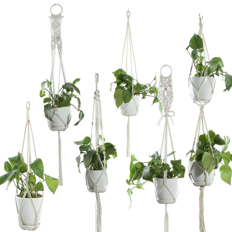 Beige handmade cotton rope hanging basket sling holding a flower pot with 12-18cm bottom diameter