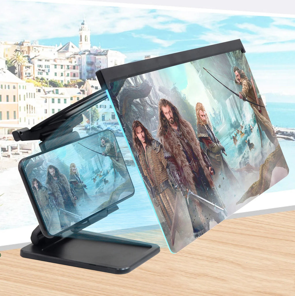 Black L20 split mobile phone screen magnifier with acrylic lens on a table next to its mounting bracket.