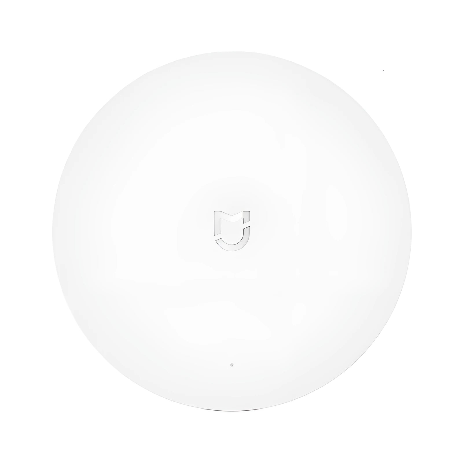 White circular Xiaomi Mijia smart home gateway with UK plug for wireless device control
