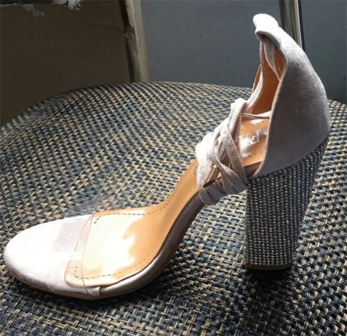 Plastic high heels with pointed toe in black and gold colour options