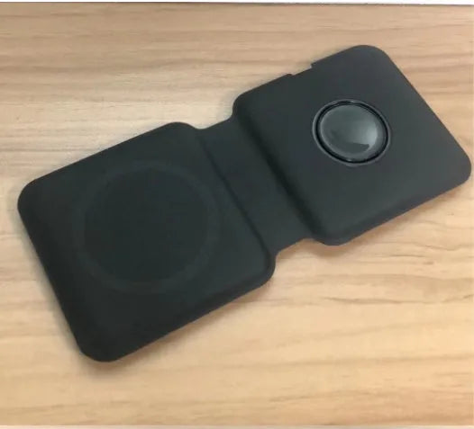 White foldable magnetic wireless charging dock showing dual charging pads for two phones