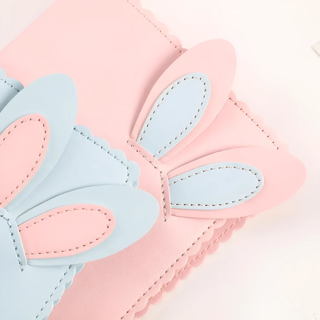 Cute rabbit-themed mini photo album with PU cover in blue, pink, or white, showing loose-leaf pages.