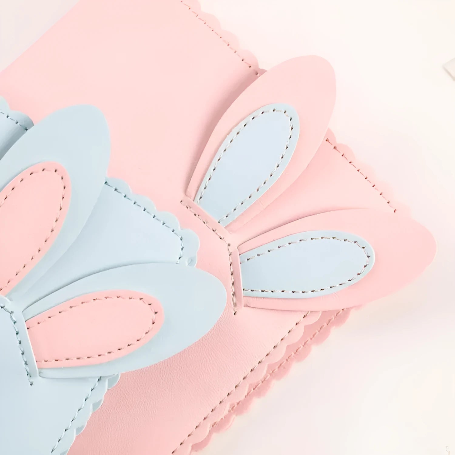 Cute rabbit-themed mini photo album with PU cover in blue, pink, or white, showing loose-leaf pages.