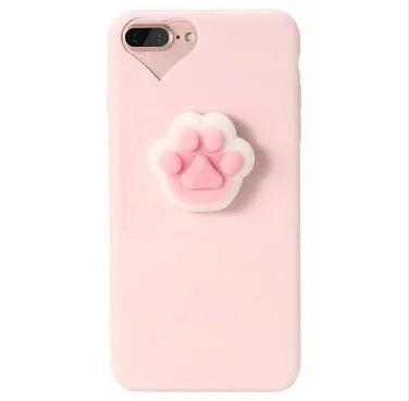 Soft silicone iPhone case with a raised 3D cartoon cat design, shown in pink.