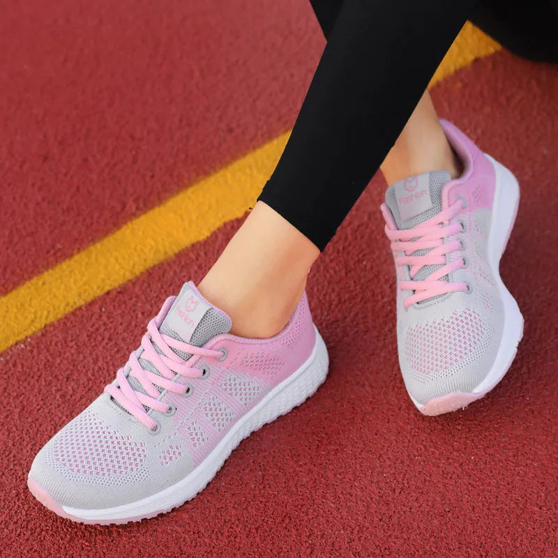Women's white high-top casual sneakers with back lacing and a flat board sole.