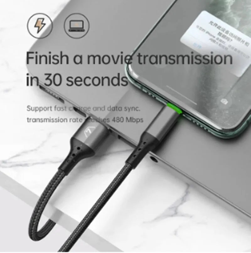 Black Apple iPhone charger cable with LED indicator lights showing orange and green colours