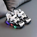 Children's breathable mesh sneakers with Velcro fastening in black, pink, and grey colours