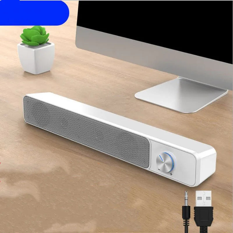 Black and white desktop computer speakers with USB cable and Bluetooth connectivity options