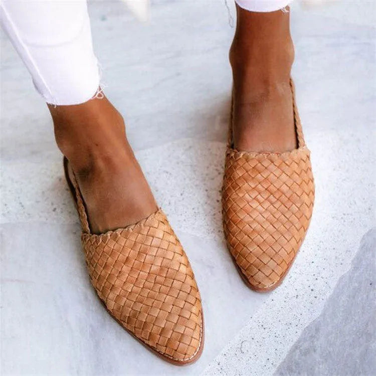 Women's pointed toe baotou flat sandals with a buckle closure, shown in one of six available colours.