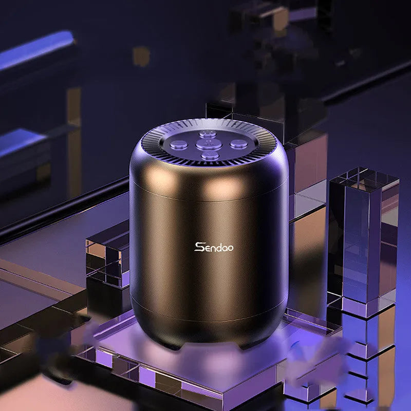 Small black or white wireless Bluetooth speaker with super subwoofer on a desk.