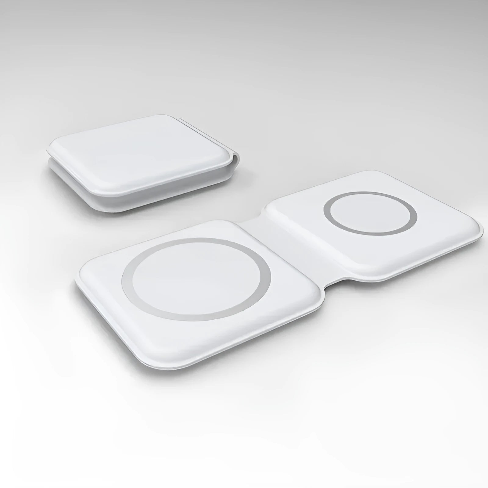 White foldable magnetic wireless charging dock showing dual charging pads for two phones